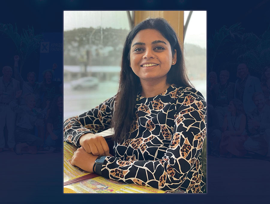 Portrait of Ankita Shukla sitting at a table.